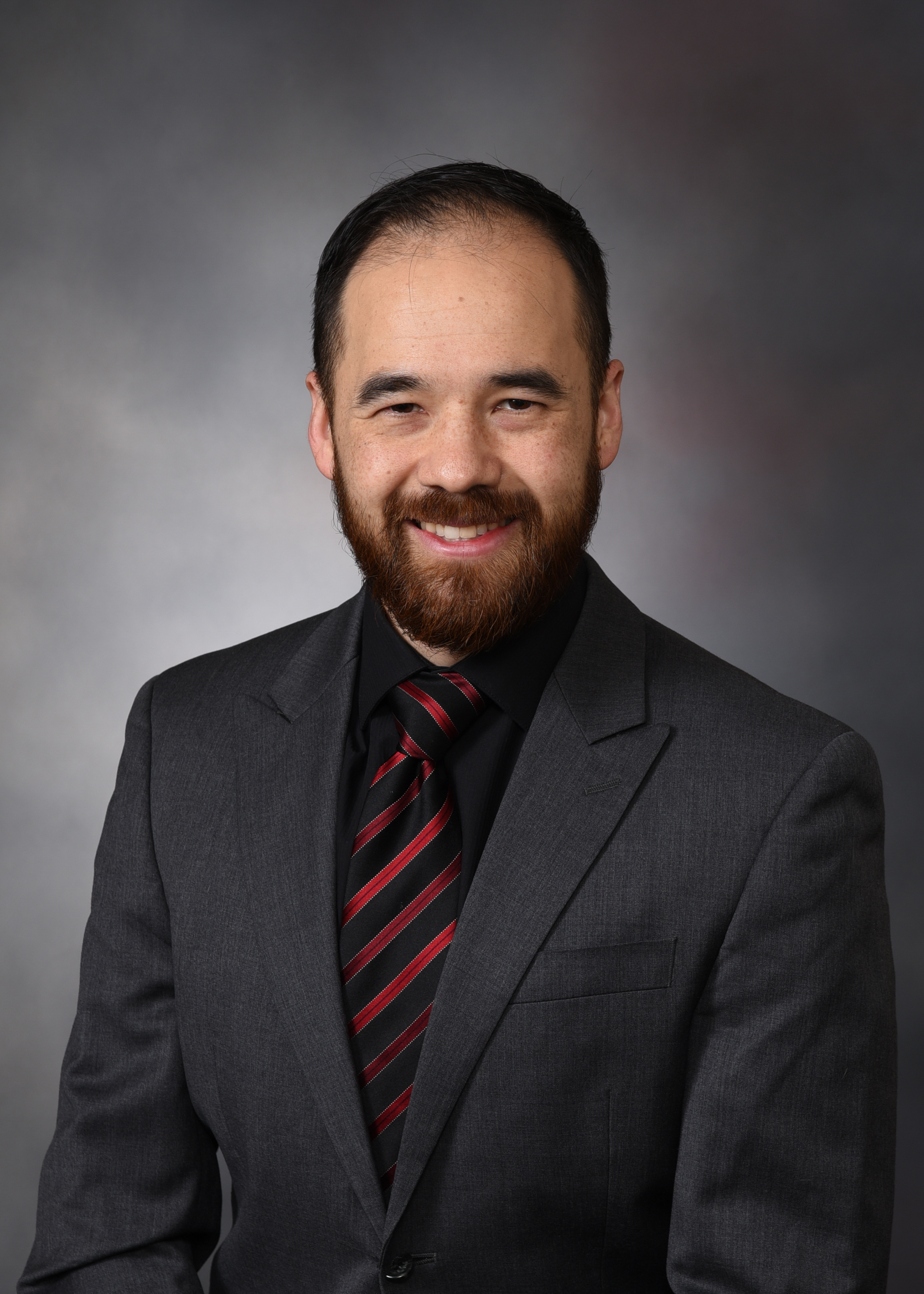 A headshot of Tama Thé