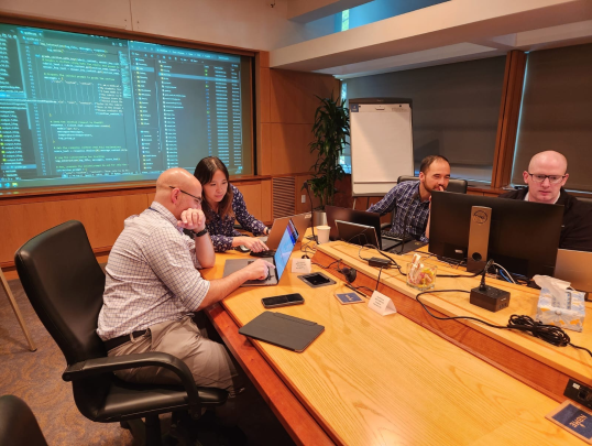 seef fellows working in conference room