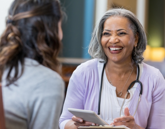 Nurse and woman talking