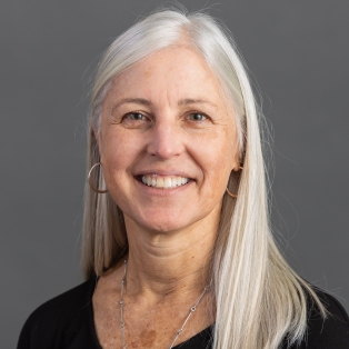 Headshot of Vicki Girard