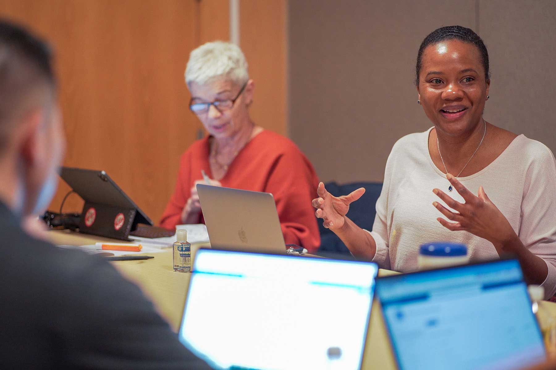 NBME medical experts collaborating in a meeting